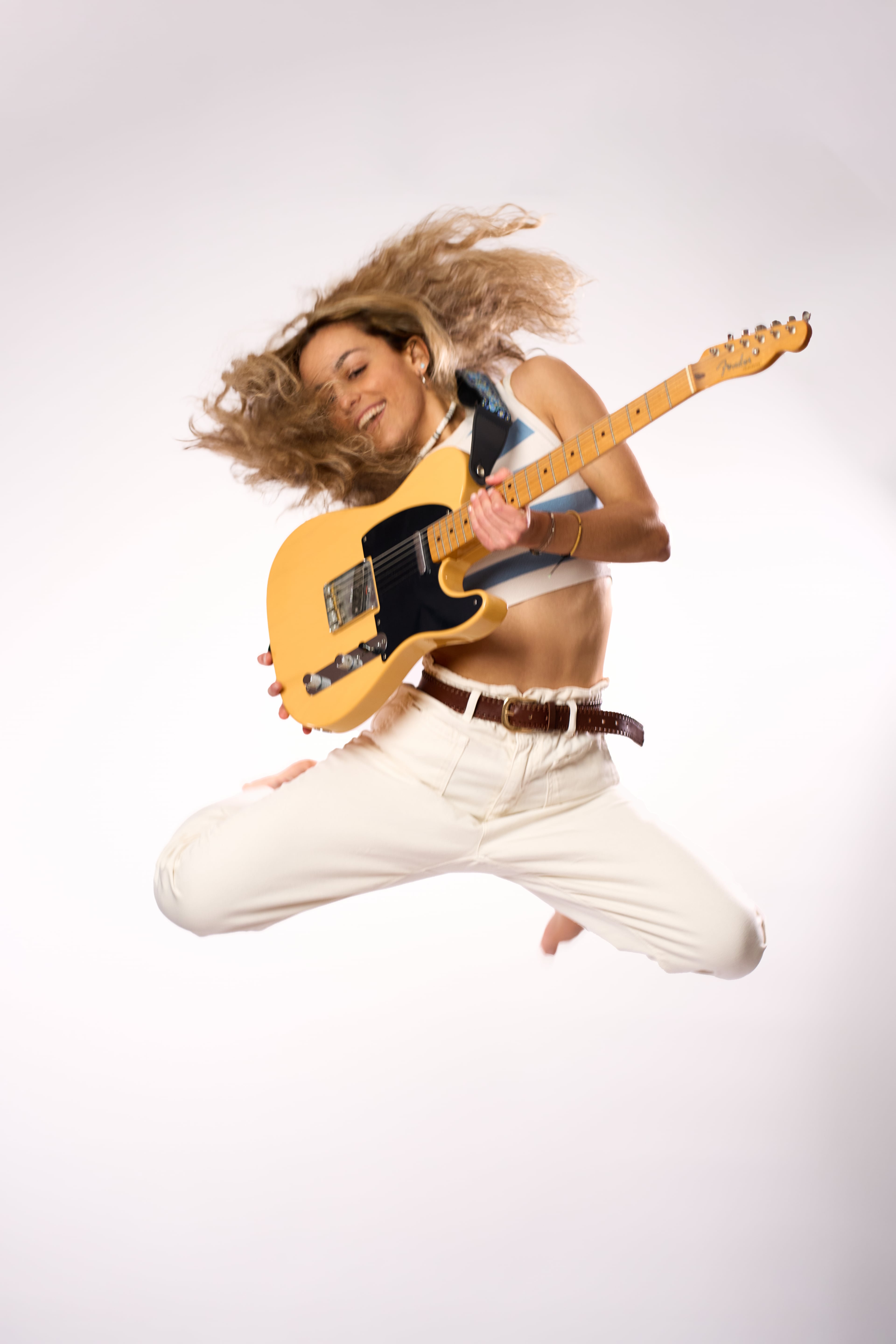 Studio portrait of music artist Eaupale photographed in a controlled lighting environment for her visual identity and cover art suite