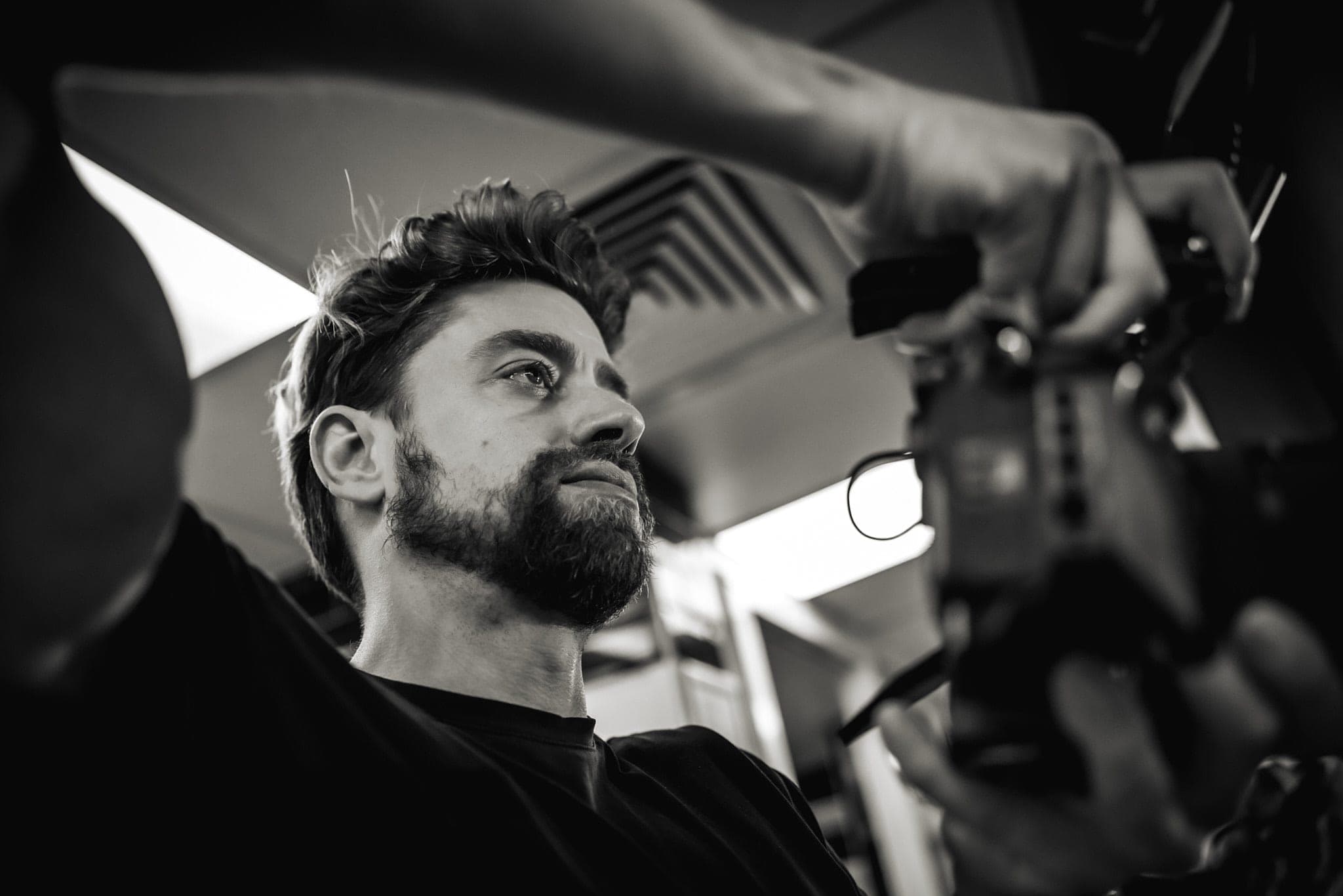 Etienne Morax preparing camera equipment on set in London