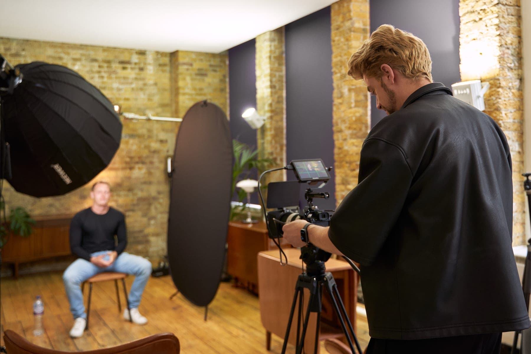 Etienne Morax directing a filmed interview in London
