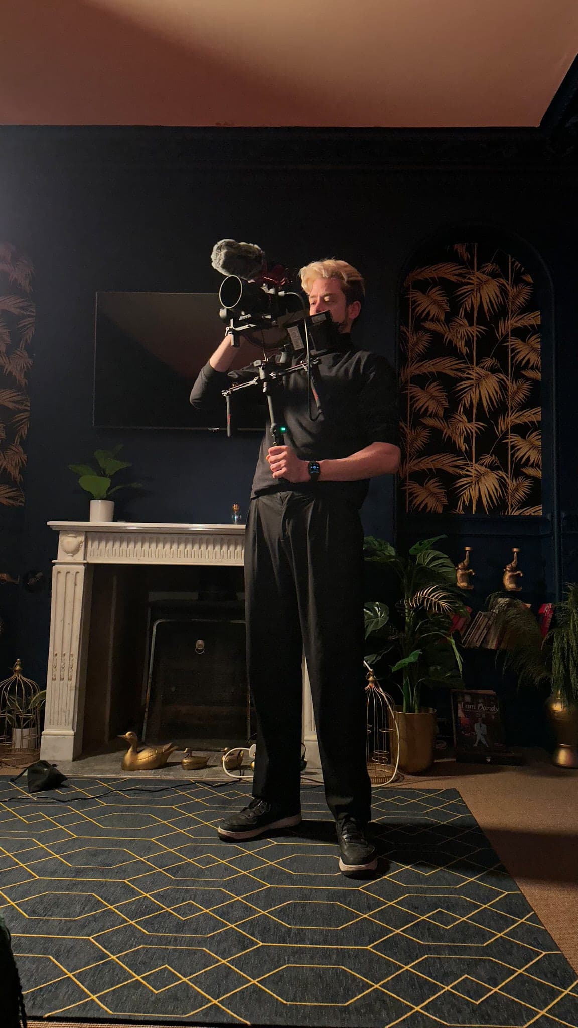 Etienne Morax directing sound, framing, and capture during a live production.