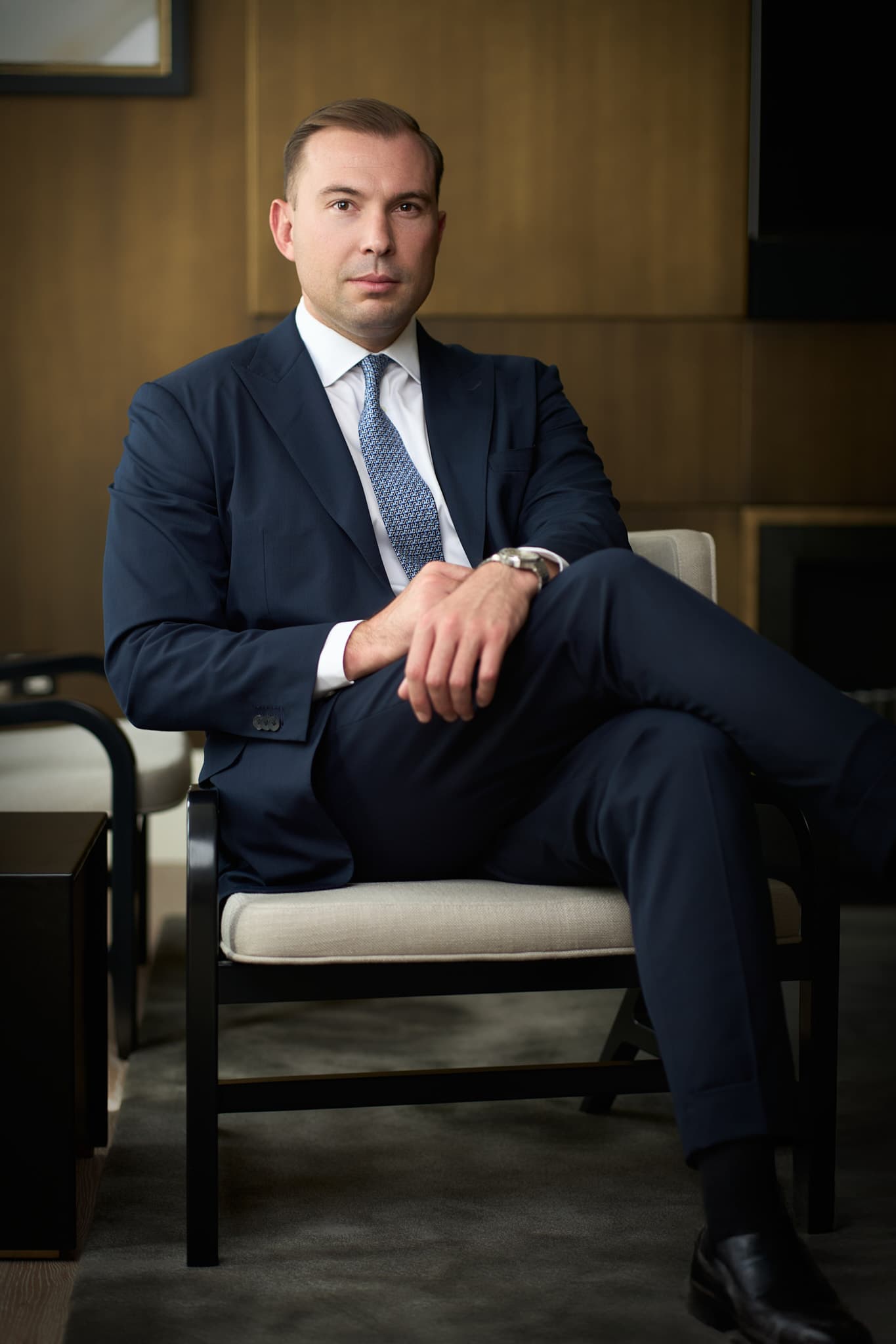Professional businessman in navy suit — executive headshot in London