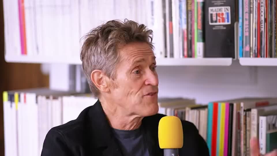 Still from Are We On Air willem dafoe podcast interview in London