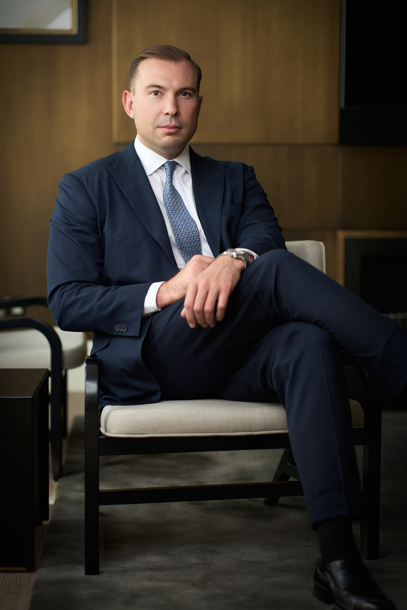 Professional businessman in navy suit — executive headshot in London