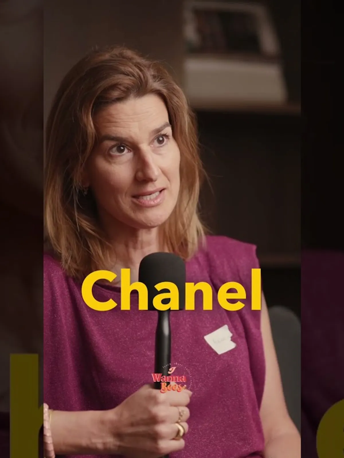 A woman entrepreneur being interviewed at an I Wanna Bees networking event in London.