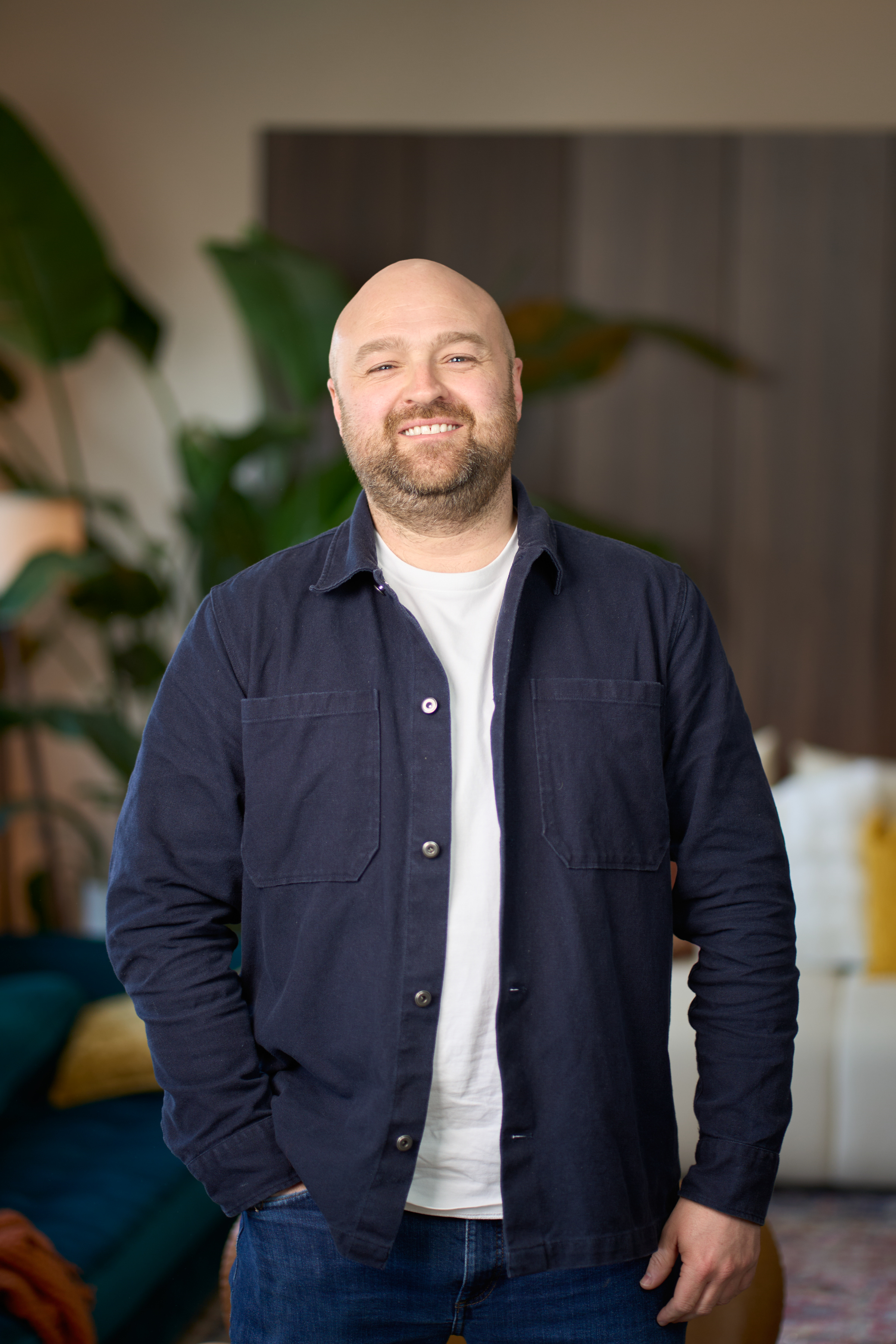 Professional headshot of Entourage BD team member at The Designer's Penthouse studio London